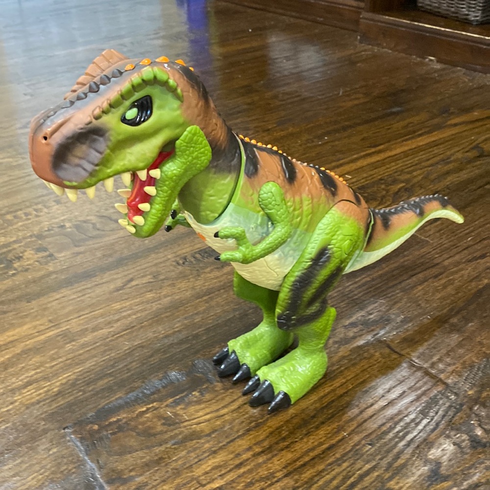 Green & brown dinosaur with sound effects
